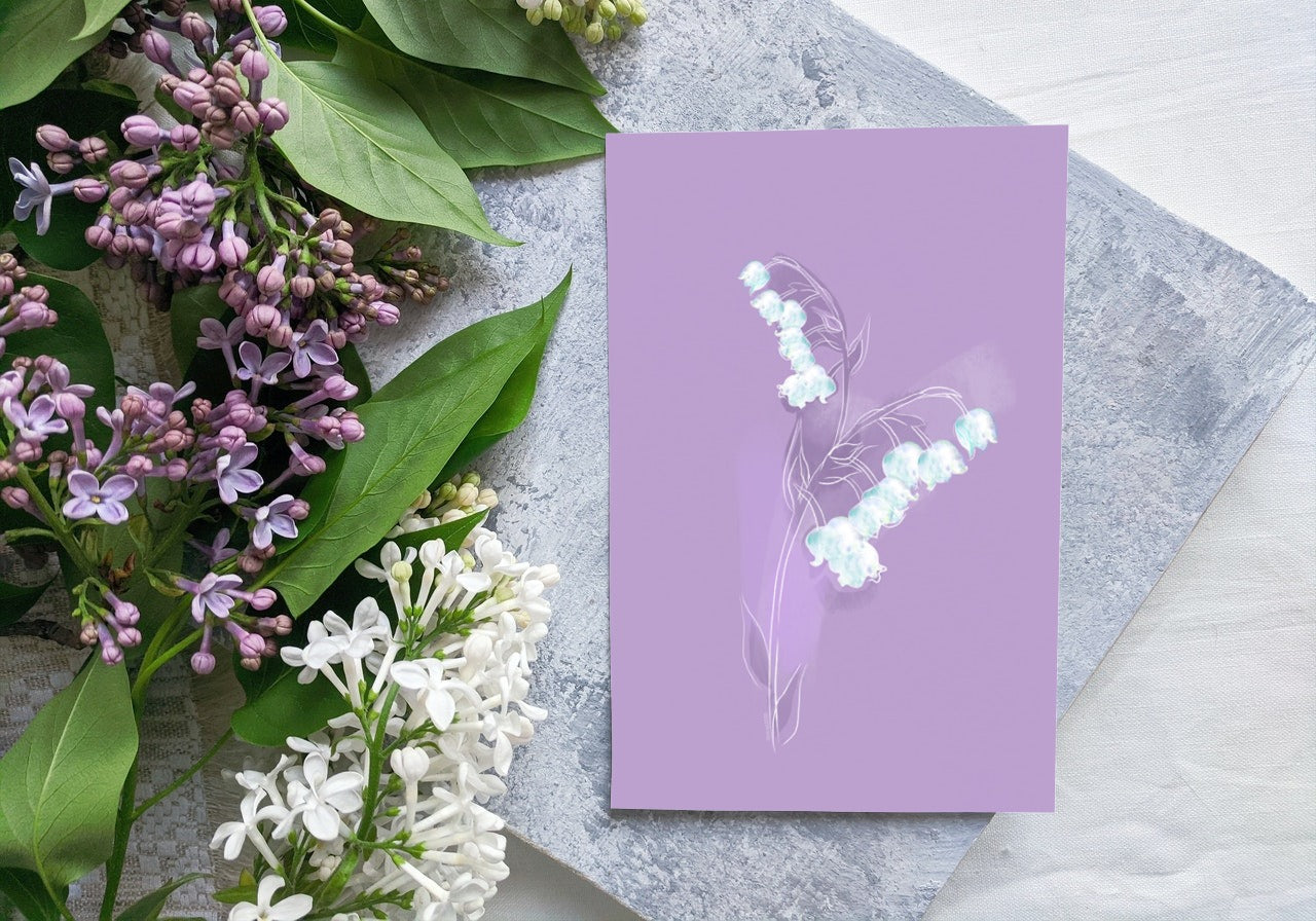Lily of the Valley greeting card displayed beside fresh flowers, elegant May birth flower stationery