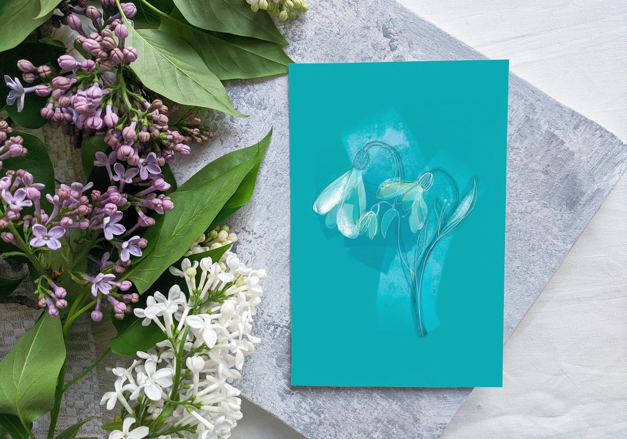January Snowdrop birth flower greeting card front view on soft neutral background with flowers