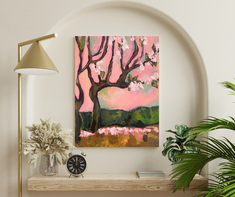 Cherry Blossom Dream canvas wall art displayed in a modern living room with soft pink floral landscape painting on a neutral wall