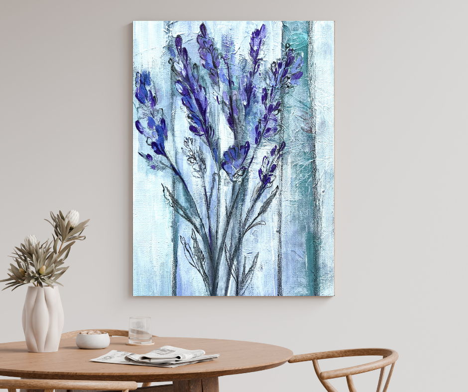 Lavender canvas wall art in soft purple tones displayed above a wooden dining table in a minimalist modern space