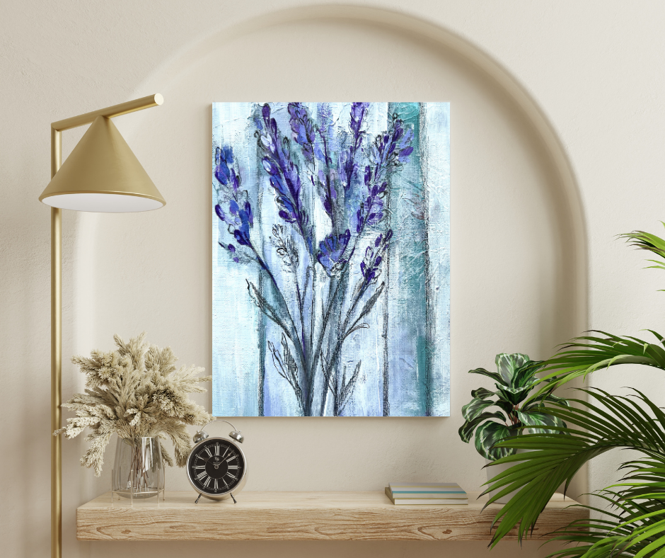 Lavender canvas wall art in soft purple tones displayed above a wooden shelf with lamp and plants in a calm modern space