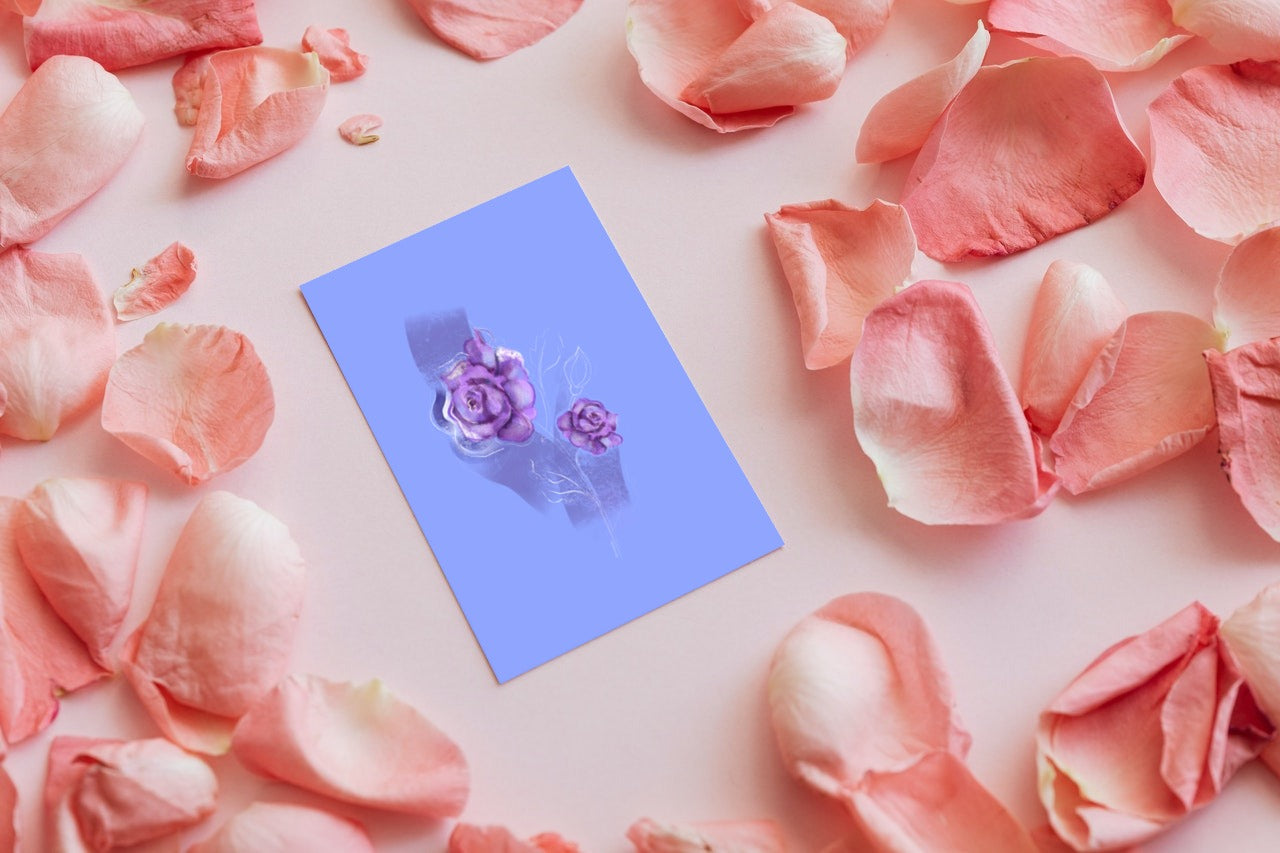June rose birth flower greeting card surrounded by pink petals