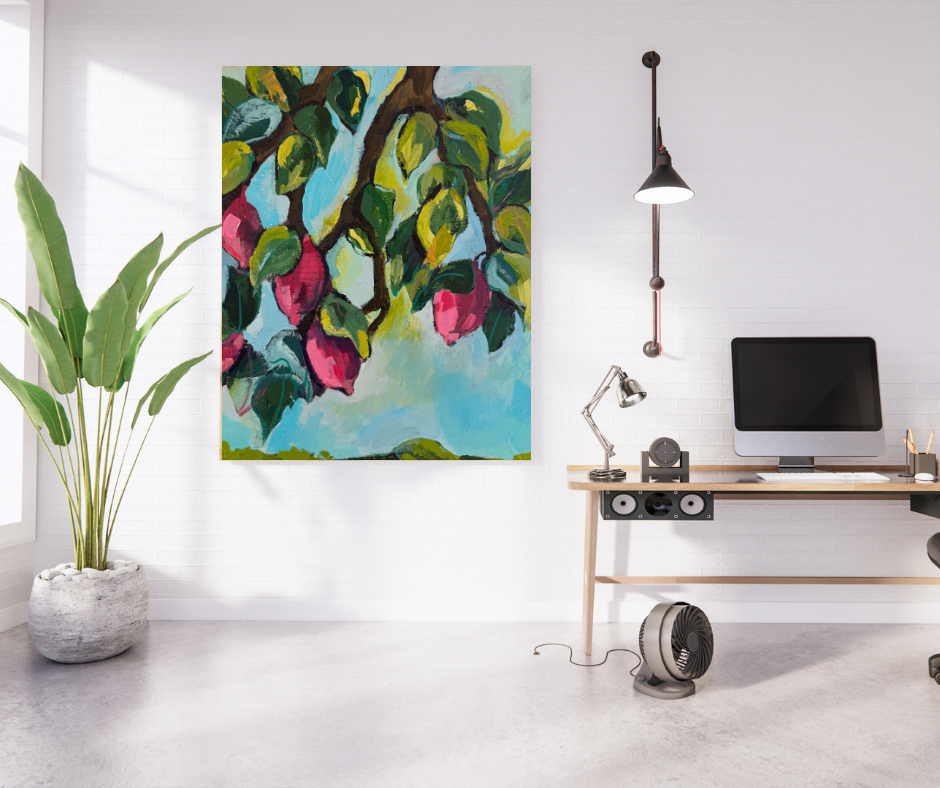 Purple lemons canvas wall art with vibrant fruit and green leaves displayed in a modern office workspace above a desk with computer and plant