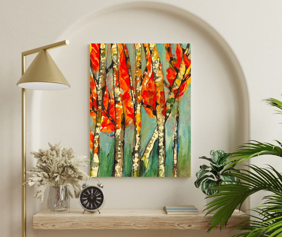 Colorful autumn trees canvas wall art displayed on a wall shelf in a modern neutral living space