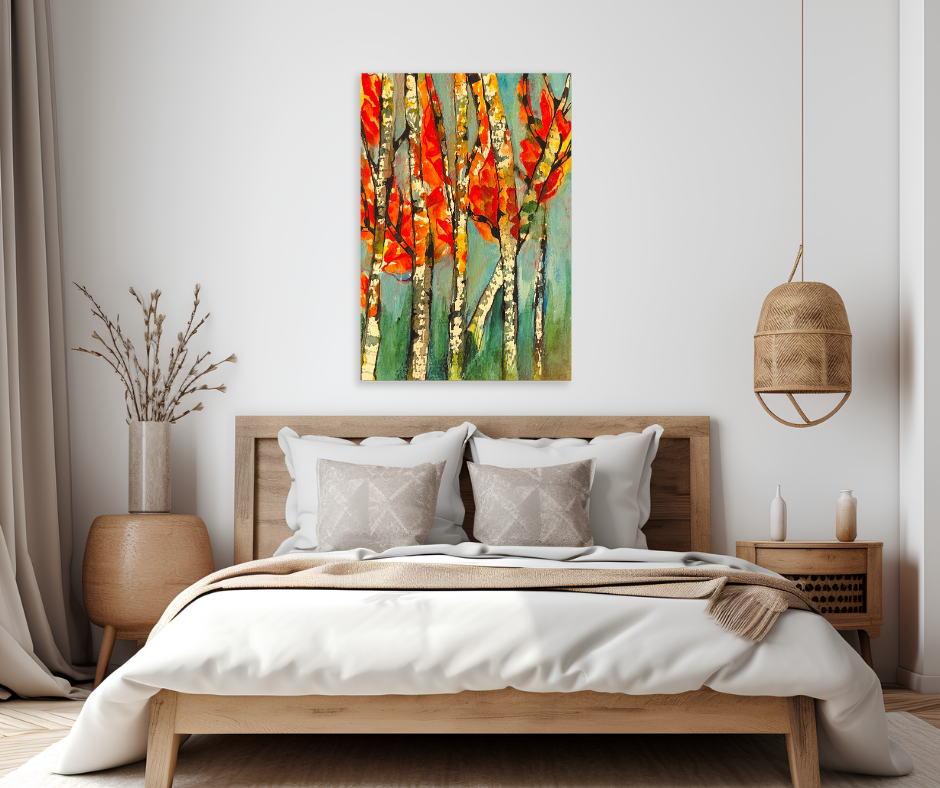 Autumn trees canvas wall art displayed above a bed in a calm modern bedroom