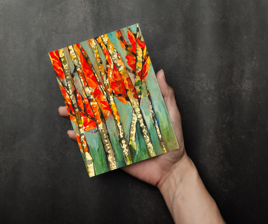 Whispers of Fall greeting card featuring vibrant autumn trees with orange and red leaves held in hand against a dark background