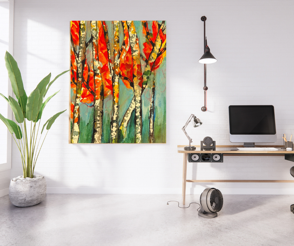 Autumn trees canvas wall art displayed above a desk in a modern home office