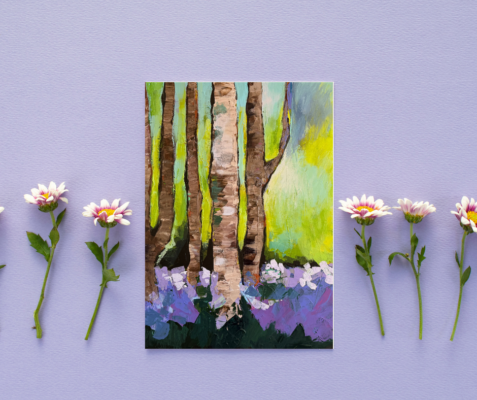 Woodland Serenity greeting card with impressionist forest artwork displayed on a soft purple background with decorative flowers