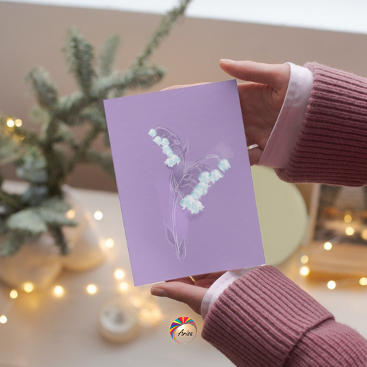 "LILY OF THE VALLEY" Greeting Card by ArisaTeam in the hands of a woman ideal as a Christmas card.